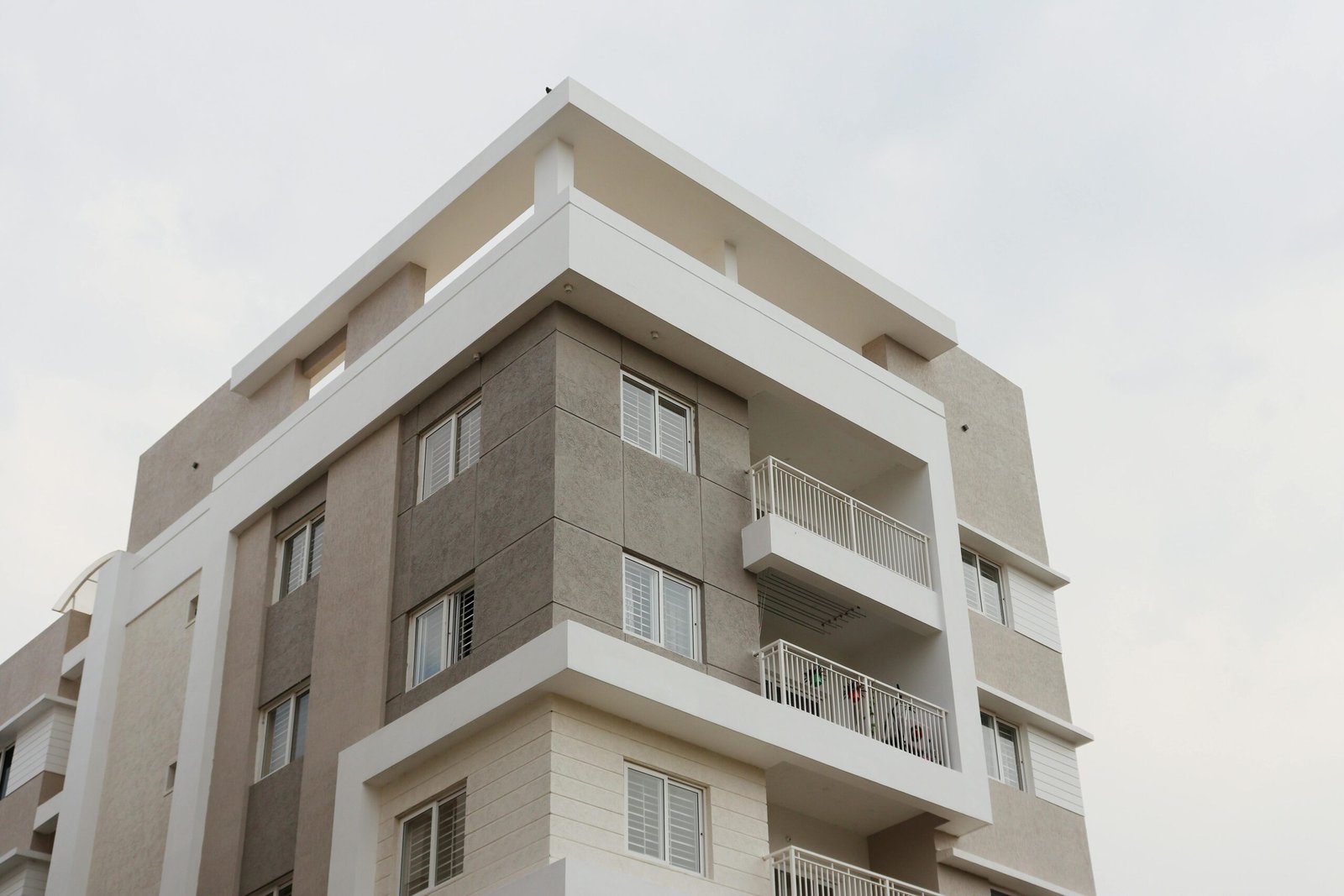 Contemporary apartment building with balconies captured in Hyderabad, India.